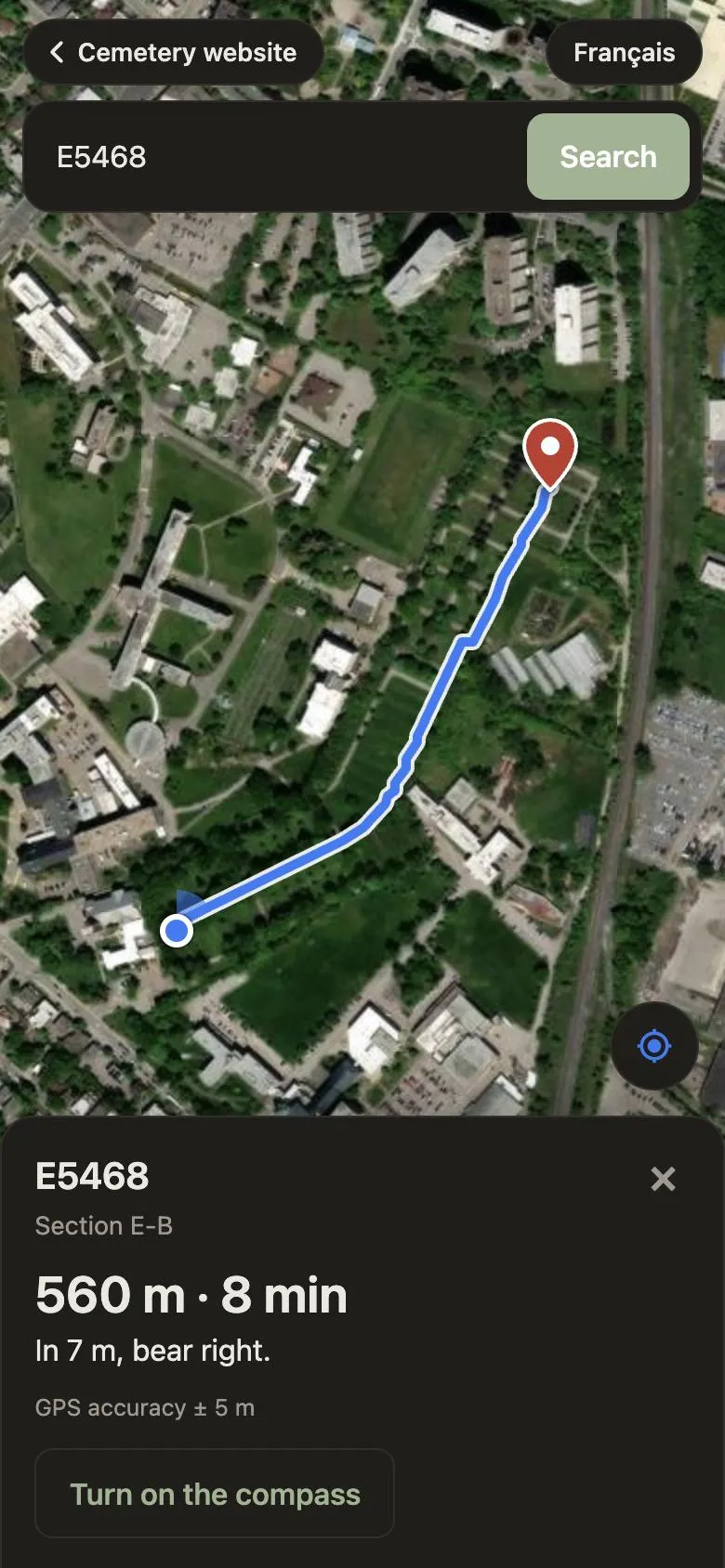 The grave finder on a phone: a walking route from the cemetery gate to plot E5468, 560 m, 8 minutes